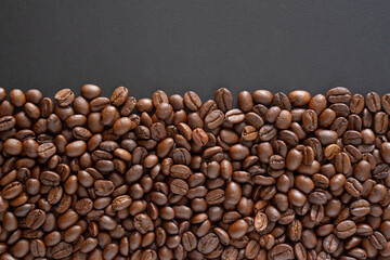 Coffee beans background. Top view coffee beans with copy space area for your text. Close up image.