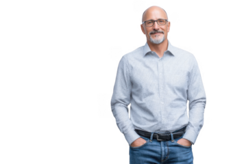A confident middle-aged man with glasses stands casually with his hands in his pockets against a plain light background. exuding professionalism and approachability. ideal for corporate or lifestyle