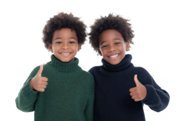 Two cheerful children with curly hair giving thumbs up while wearing cozy turtleneck sweaters. set against a clean white background. conveying happiness and friendship