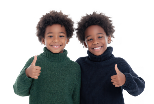 Two cheerful children with curly hair giving thumbs up while wearing cozy turtleneck sweaters. set against a clean white background. conveying happiness and friendship