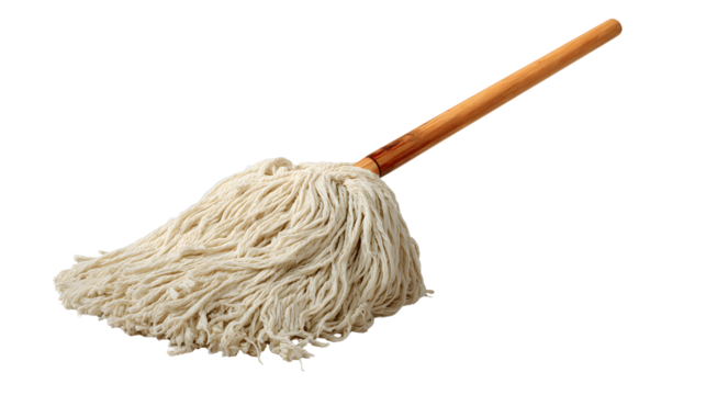 A white mop with a wooden handle is laying 