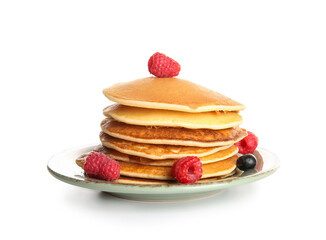 Plate of tasty pancakes with raspberries and blueberry on white background