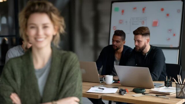 Casual Business Team Working Together Around Laptop in Modern Office
