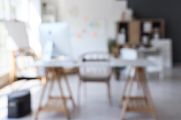 Blurred view of modern office with workplace
