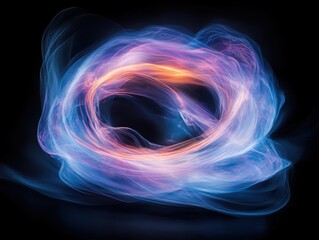 Obraz premium Colorful swirling pattern created by light in an artistic display during nighttime