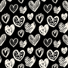 Grunge heart semless pattern on black background. Felt pen doodle heart pattern. Marker pen hand drawn hearts romantic design for fabrics, textile, wrapping paper, romantic packaging