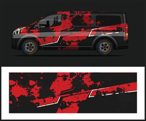 Dynamic Van Wrap Design Red Splatter and Geometric Accents on Black Van