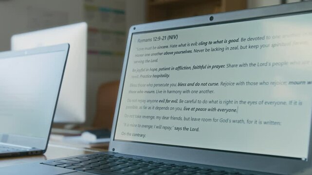 No people close up shot of screen of laptop with Bible quotes during computer science lesson in religious school