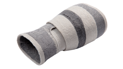 Soft, striped fabric vase sleeve for home decor, designed to hold small plants or flowers, isolated on white background.