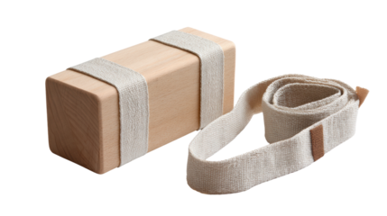 Yoga block and strap set on white isolated background for fitness and wellness activities.