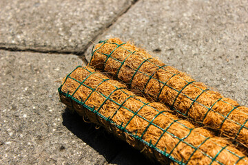 Coconut fiber trellis to help support climbing plants