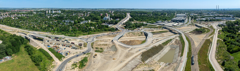 Krakow, Poland. Grebalow large highway and tramway interchange under construction. The fragment of S7 from Warsaw to A4 and last fragment of ring road around Krakow. Aerial view. State in January 2025