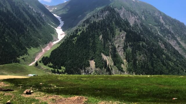 Captured in motion through Minimarg, this scenic view showcases snow-covered peaks, lush green meadows, and serene mountain landscapes &mdash; a perfect harmony of nature&rsquo;s beauty in Skardu, Pakistan.





