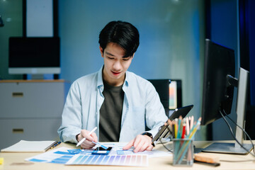  UX developer and ui designer brainstorming about mobile app interface wireframe design with...