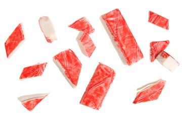 Cut tasty crab sticks flying on white background © Pixel-Shot