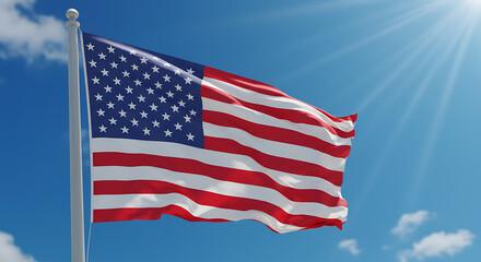 Obraz premium American flag waving proudly in a clear blue sky.