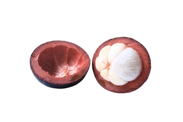 Fresh mangosteen fruit cut in half, isolated on white background.