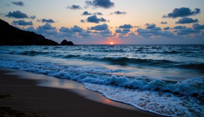 ocean at dusk, beach, sun setting, coastal landscape, night copy space: ample optimized for photo use avoid trademarked terms, specific names, or unnecessary words.