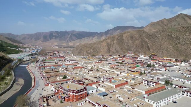 Xiahe, China: Aerial drone footage of ancient temples in the Tibetan Buddhism Labrang Monastery in the Xiahe town on the Tibetan plateau.
