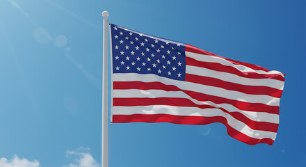 Fototapeta premium American flag waving proudly in a clear blue sky.
