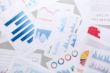Many business graphics and diagrams on grunge grey background