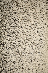 Textura de coluna de cimento com grãos grandes de pedra. Cimento grosso com pedregulhos 