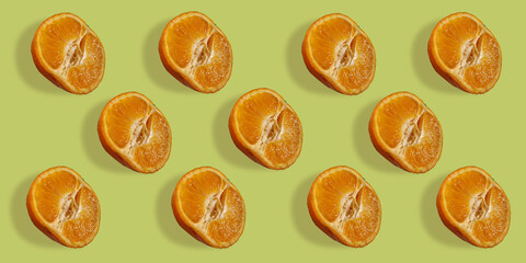 Fruit pattern  fresh mandarin on light color background. Trendy summer concept top view. Citrus in minimal style flat lay.