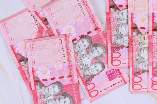 Dominican Republic peso, DOP currency various banknotes are scattered on surfaced significant value.