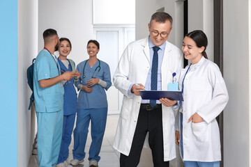 Doctors and medical interns in hall