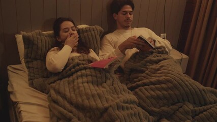 Couple Enjoying Books in Bedroom
Couple Reading Books Together in Bed
Relaxing Bedtime Routine – Couple Reading Together