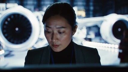 Cybersecurity expert reviewing aviation data logs at a workstation desk scene