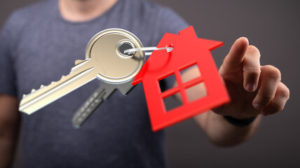 Person holding house keys, symbolizing new home ownership. Real estate, home buying, property.