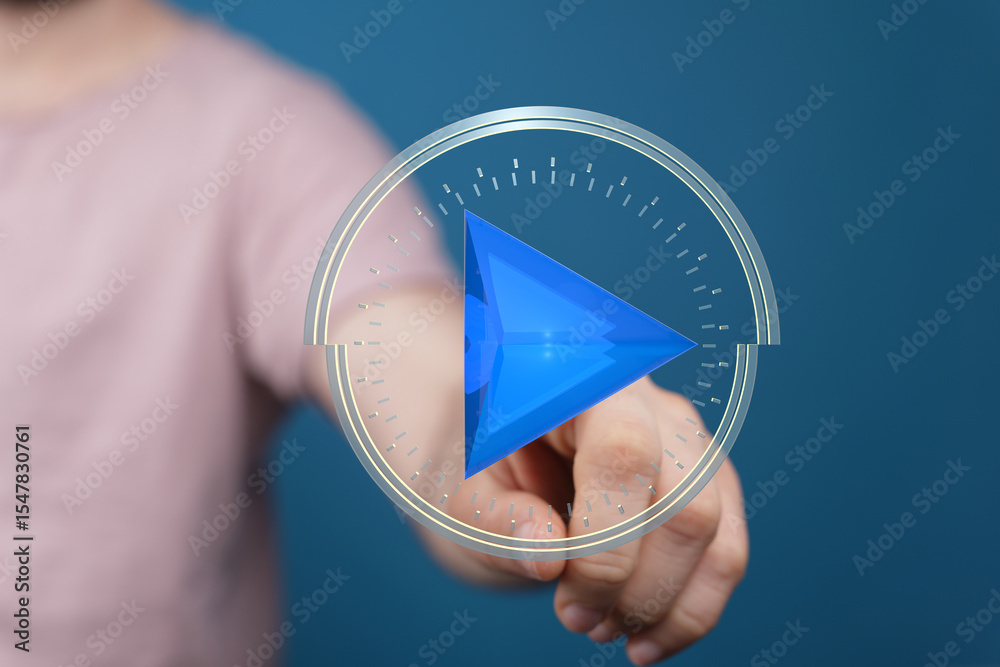 Poster hand interacting with a futuristic play button. concept for digital media, technology, and user expe