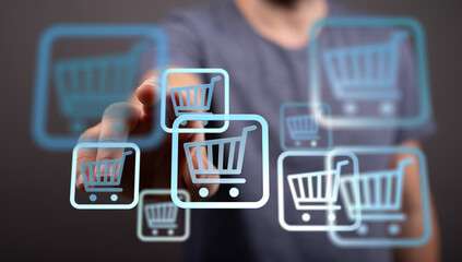 Person interacts with virtual shopping carts, symbolizing online shopping and e-commerce.