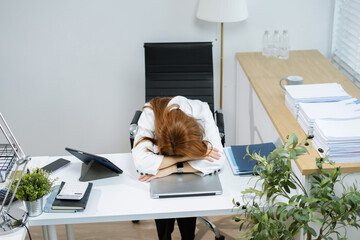 stressed businesswoman working in the office. Businesswoman thinking too much work concept in the...
