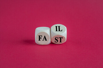 Fail fast symbol. Concept words 'fail fast' written on beautiful pink background. Business and fail fast concept.