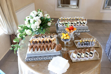 Beautiful sweet buffet with pastries, cakes and tartlets. Sweet desserts.