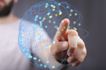 Person interacting with a digital network.  Global connection, data analysis concept.