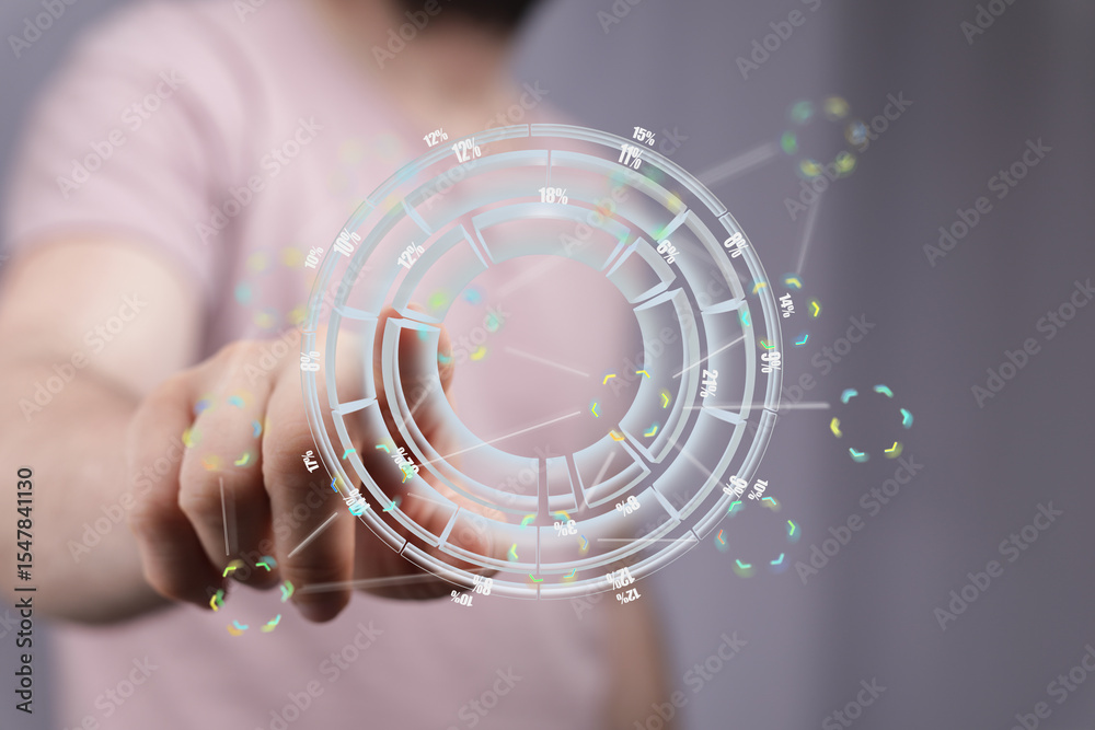 Poster Stock photo of a person using a transparent holographic display showing data charts and graphs.