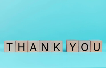 Wooden block with thank you message, business concept and thank you, thank you symbol 