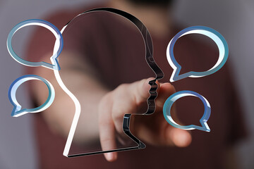 Abstract image of a person interacting with translucent speech bubbles, representing communication...