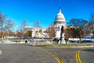 US Capitol in Washington DC in winter. Cityscape with blue sky.