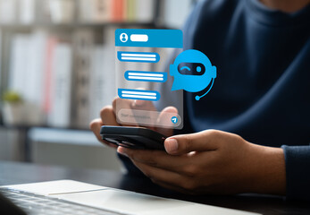 Businessman uses AI chatbot on smartphone for digital communication and customer service. Smart virtual artificial intelligence assistant, Intelligent system in today business and daily life world.