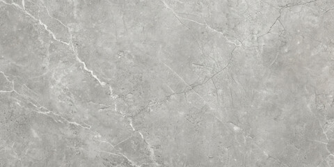 Naklejka premium Light gray marble texture with subtle veins and patterns. Ideal for backgrounds or surfaces.