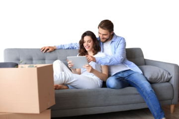 Happy couple sitting and planning new home decoration at home with a tablet at moving day, renovation and interior design for new house on a transparent background