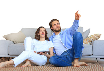 Happy couple sitting and planning new home decoration at home with a tablet, renovation and interior design for new house on a transparent background