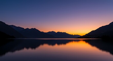 Serene Sunset over Still Mountain Lake A Breathtaking Landscape Photograph