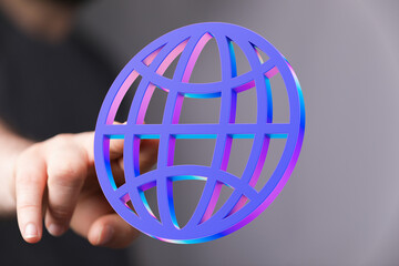 Abstract image of a hand holding a vibrant 3D globe icon, symbolizing global connectivity and...