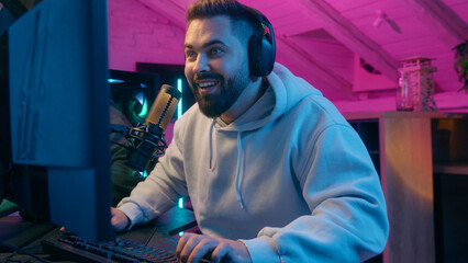 Excited winner champion Caucasian guy male gamer streamer man winning luck achievement victory...