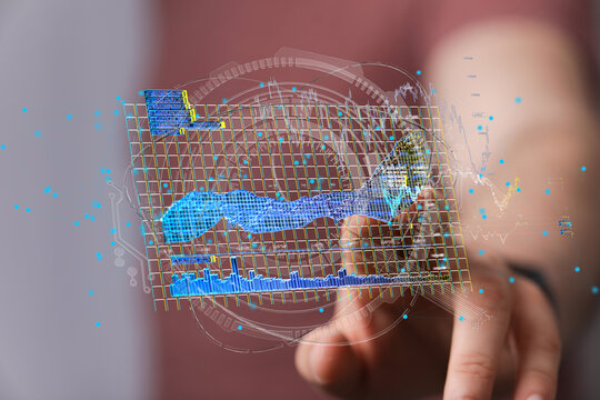Stock photo of a hand interacting with a 3D data visualization graph. Perfect for business, technology, and analytics concepts.